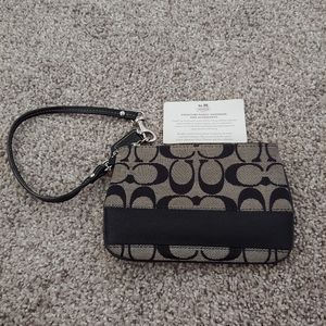 DONATING AFTER 6/25/21 Coach Signature Wristlet
